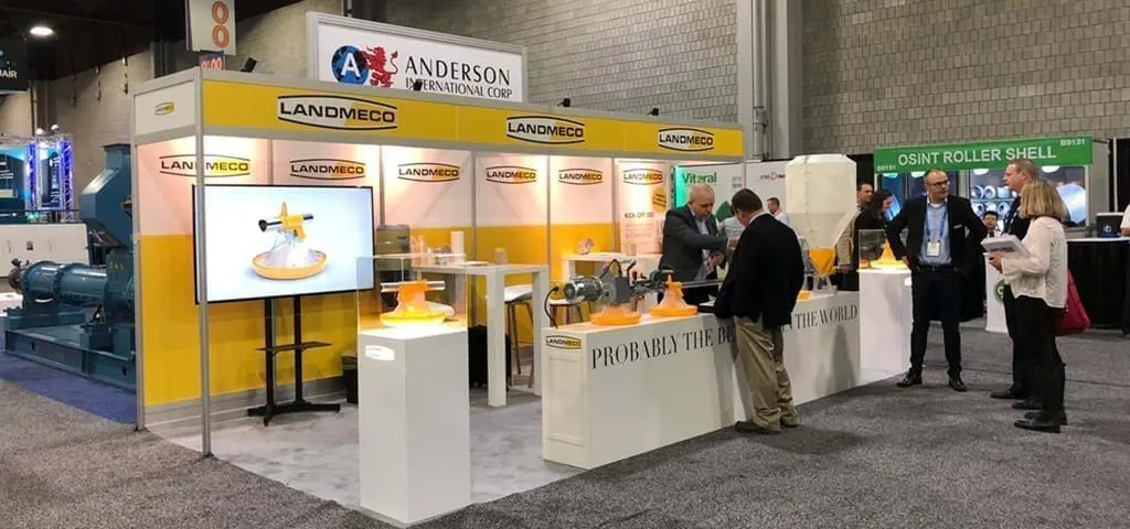 LANDMECO booth showcasing broiler feeding systems and poultry automation at an international trade exhibition.