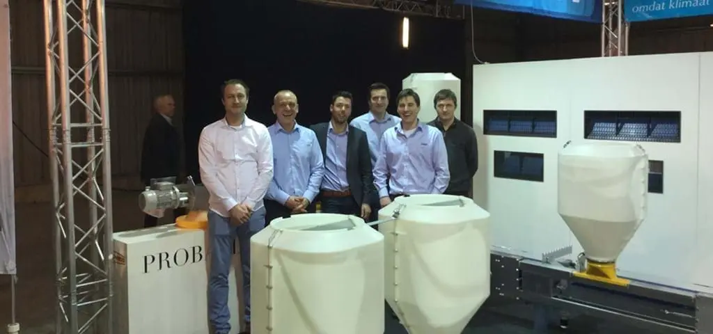 LANDMECO team showcasing automated poultry feeding and housing equipment at the Agridagen exhibition booth.