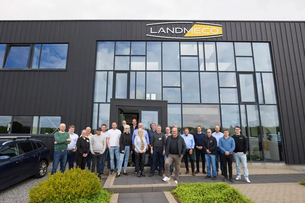 Group of Norwegian and Swedish poultry equipment dealers outside LANDMECO headquarters during a technical seminar.