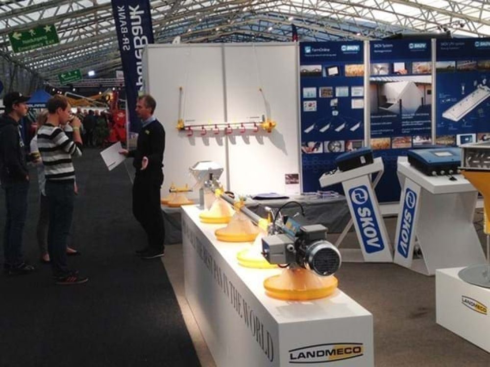 LANDMECO exhibition stand featuring advanced poultry feeding systems, SKOV automation, and professional consultation.